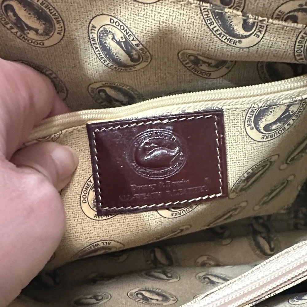Dooney & Bourke Black Leather Bag with Red Logo